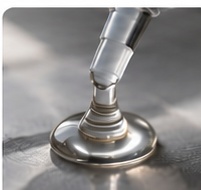 Adhesive material application